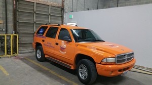 Commercial Property Damage SUV Parked At Headquarters