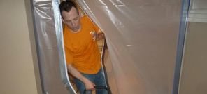 Water Damage Uxbridge Technician Using Air Mover Near Vapor Barrier