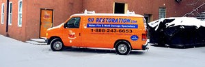 Water Damage Restoration Van At Snowy Civic Job Site