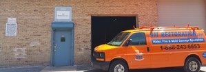 Water Damage Restoration Van Parked Outside Headquarters